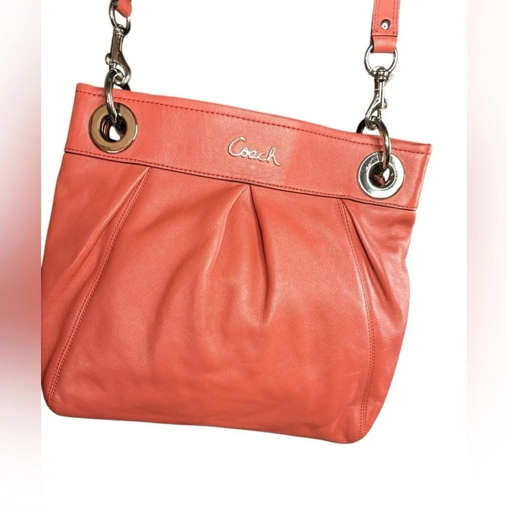 COACH women’s Coral salmon genuine leather crossbody purse NWOT silver hardware
